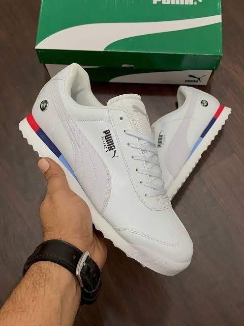 Close-up of white synthetic leather AeroWhite Luxe Sneaker with clean stitching