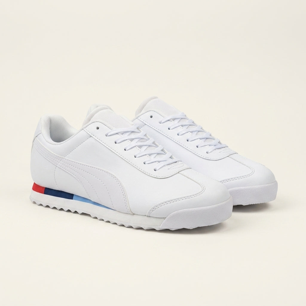Man wearing AeroWhite Luxe Sneaker with gym outfit outside a fitness studio